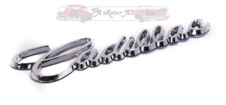 Cadillac emblem skrivstil krom